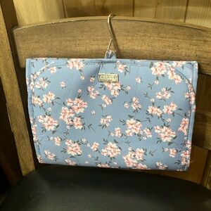 Magnetic-close floral print cosmetic bag